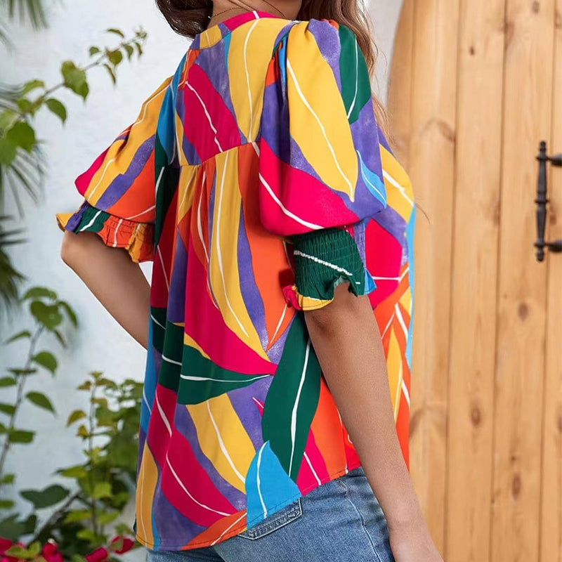🔥👚Kwiatowa bluzka z bufiastymi rękawami i dekoltem w serek dla kobiet