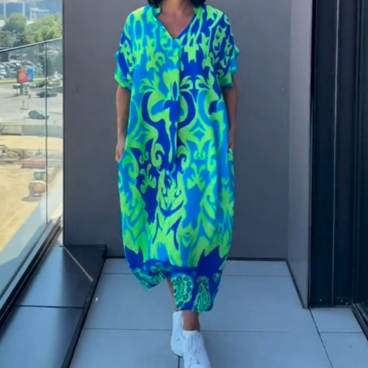 🔥👗Elegancka sukienka damska z nadrukiem i dekoltem w serek