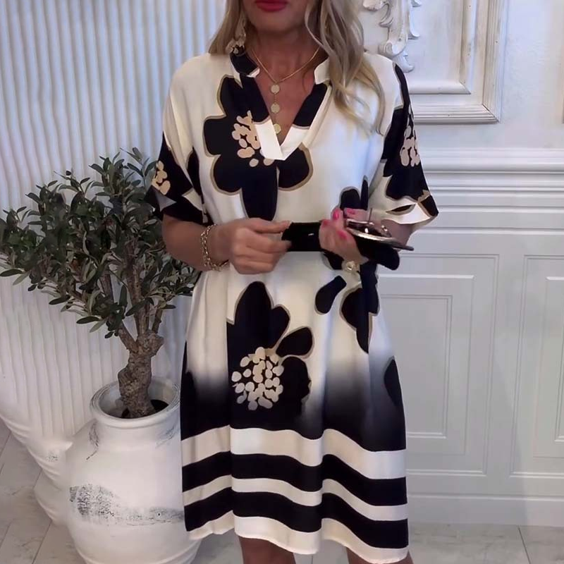 🔥👗Luźna sukienka z głębokim dekoltem w szpic