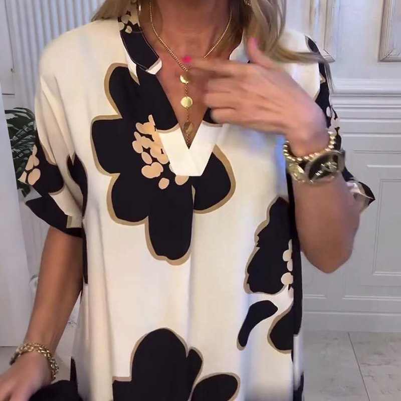 🔥👗Luźna sukienka z głębokim dekoltem w szpic